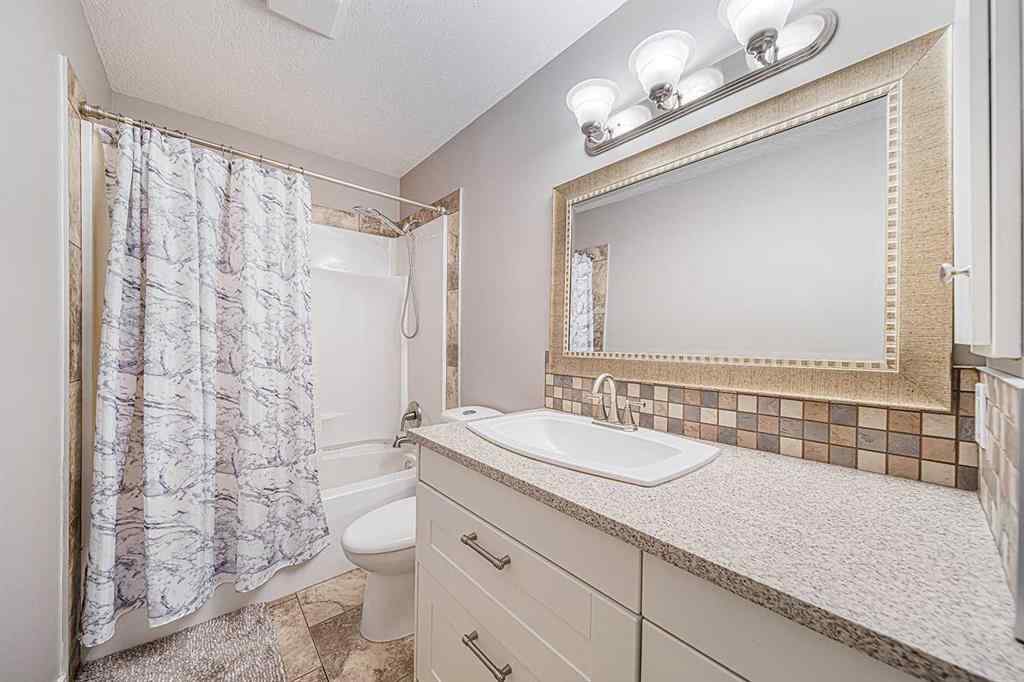 MLS® A2245588 - 104 Hawktree Green NW in Hawkwood Calgary, Residential