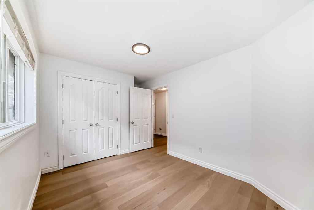 MLS® A2245594 - 18 West Cedar Place SW in West Springs Calgary, Residential
