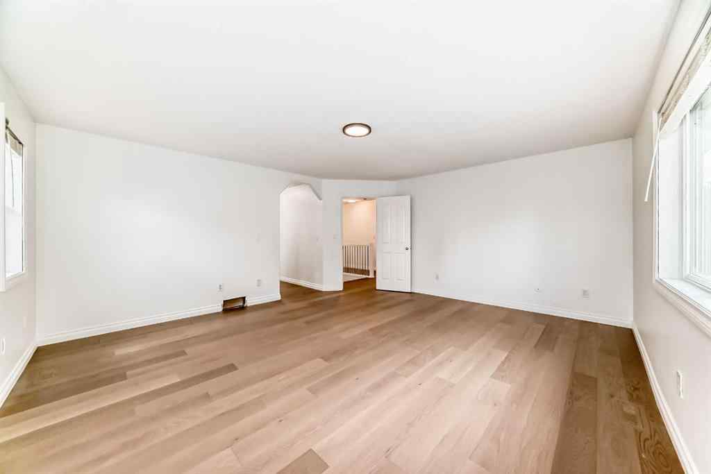 MLS® A2245594 - 18 West Cedar Place SW in West Springs Calgary, Residential