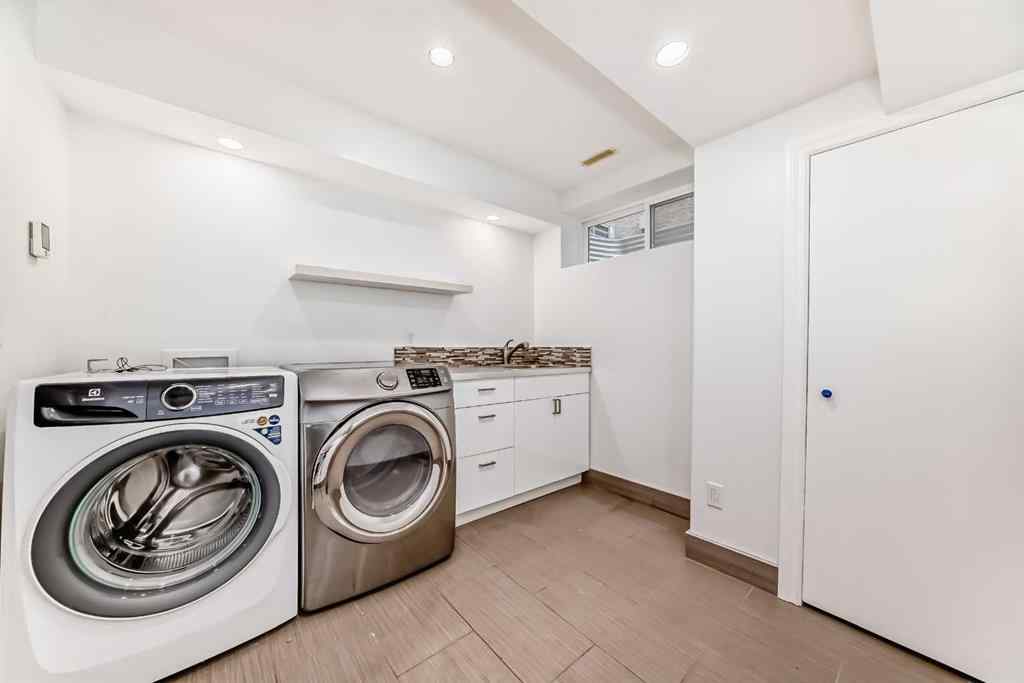MLS® A2245594 - 18 West Cedar Place SW in West Springs Calgary, Residential