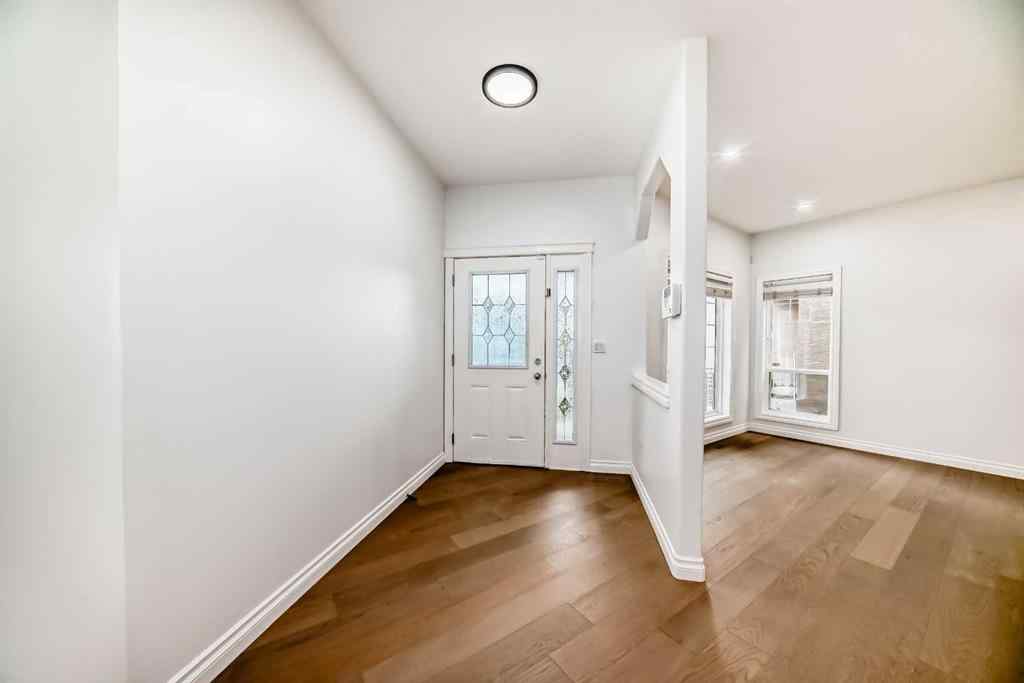 MLS® A2245594 - 18 West Cedar Place SW in West Springs Calgary, Residential