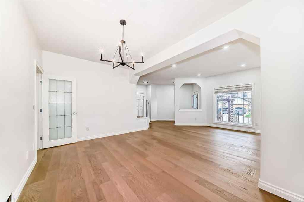 MLS® A2245594 - 18 West Cedar Place SW in West Springs Calgary, Residential