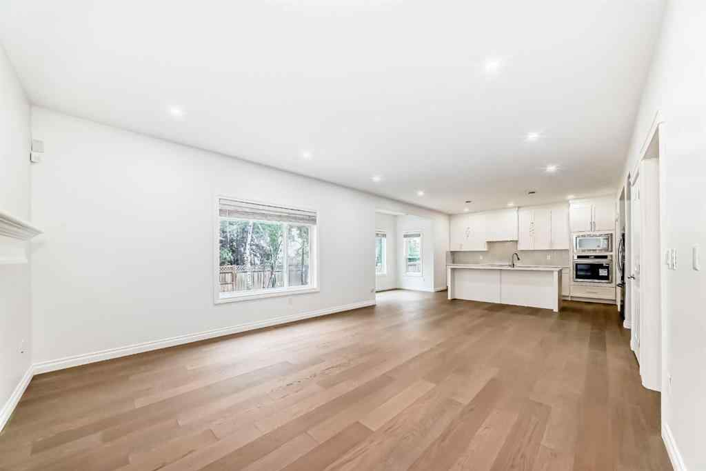 MLS® A2245594 - 18 West Cedar Place SW in West Springs Calgary, Residential