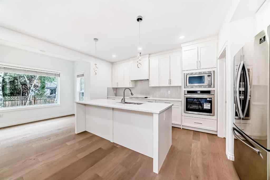 MLS® A2245594 - 18 West Cedar Place SW in West Springs Calgary, Residential