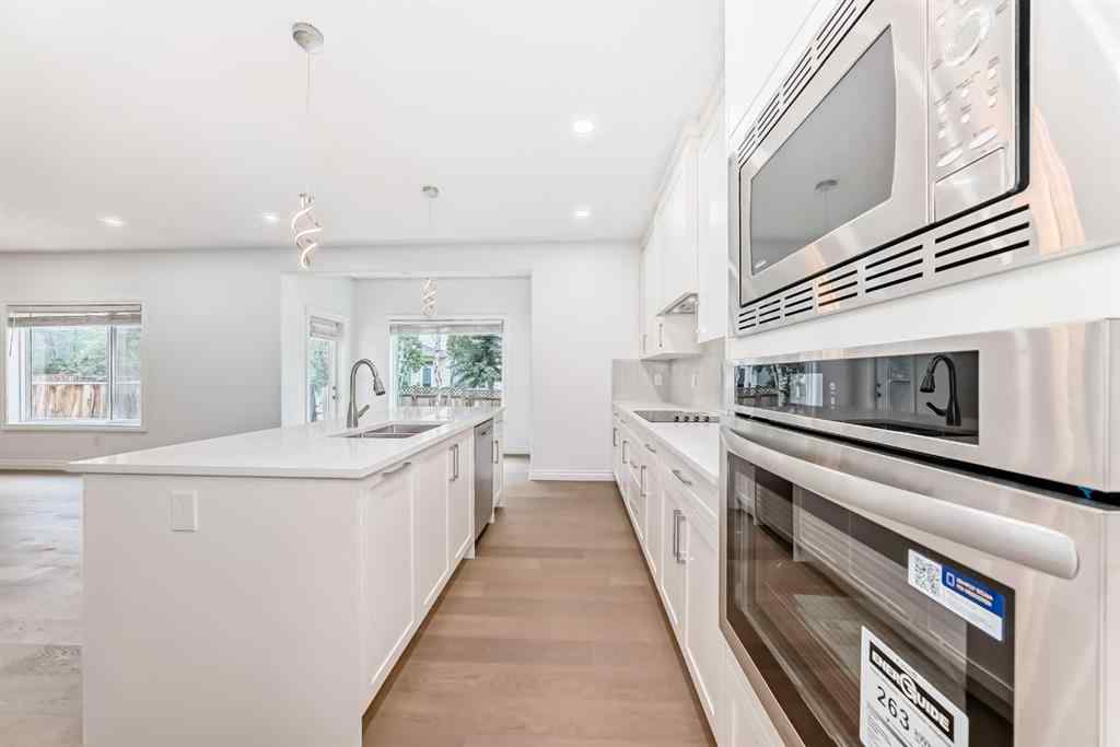 MLS® A2245594 - 18 West Cedar Place SW in West Springs Calgary, Residential