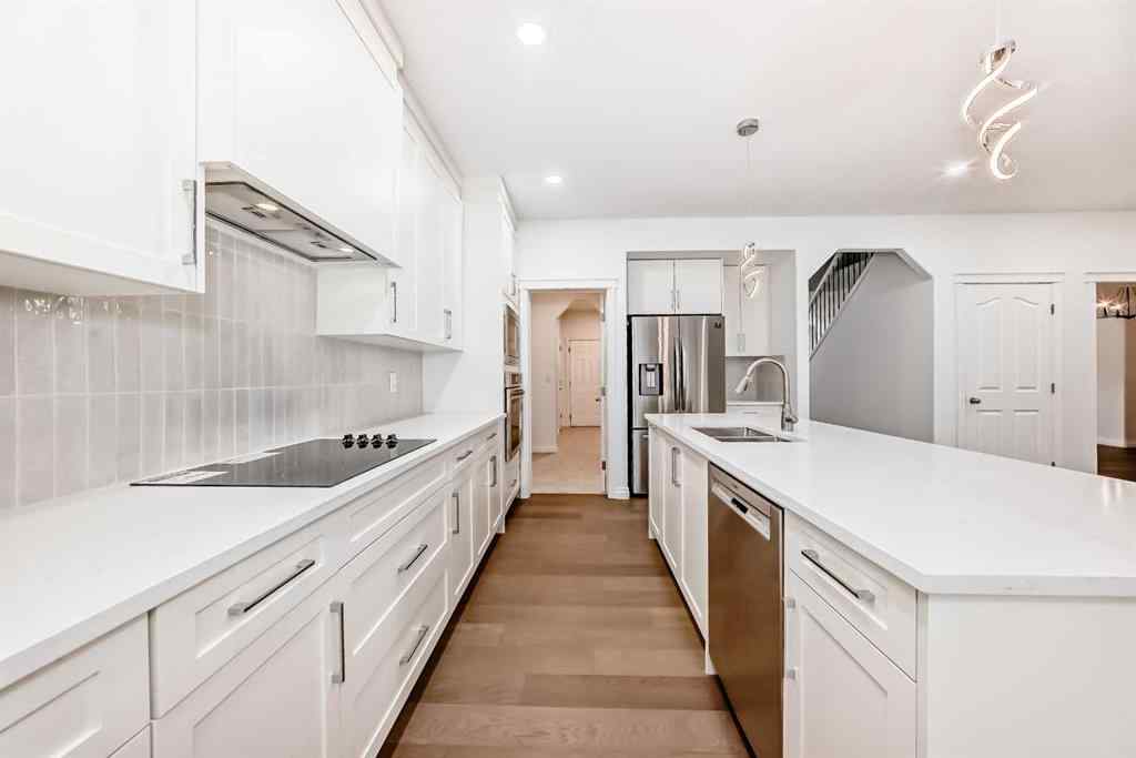 MLS® A2245594 - 18 West Cedar Place SW in West Springs Calgary, Residential