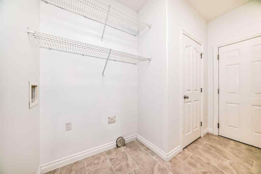 MLS® A2245594 - 18 West Cedar Place SW in West Springs Calgary, Residential