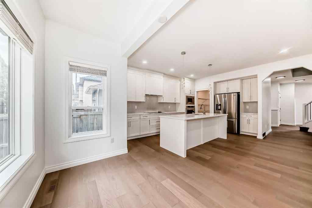 MLS® A2245594 - 18 West Cedar Place SW in West Springs Calgary, Residential