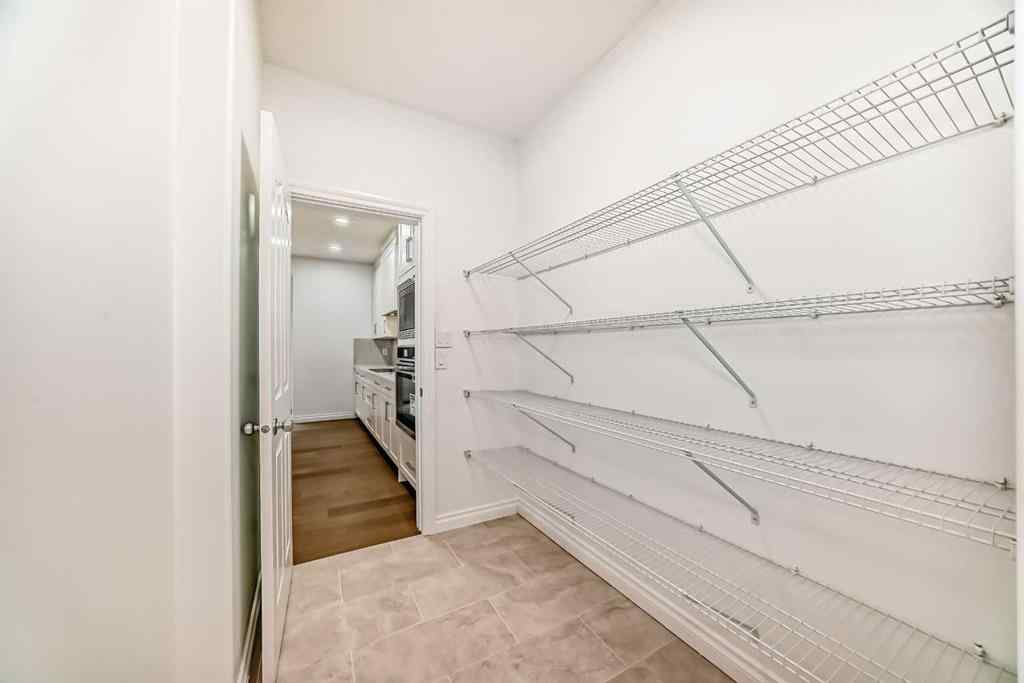 MLS® A2245594 - 18 West Cedar Place SW in West Springs Calgary, Residential
