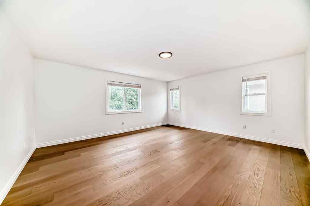 MLS® A2245594 - 18 West Cedar Place SW in West Springs Calgary, Residential