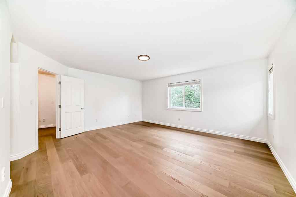 MLS® A2245594 - 18 West Cedar Place SW in West Springs Calgary, Residential