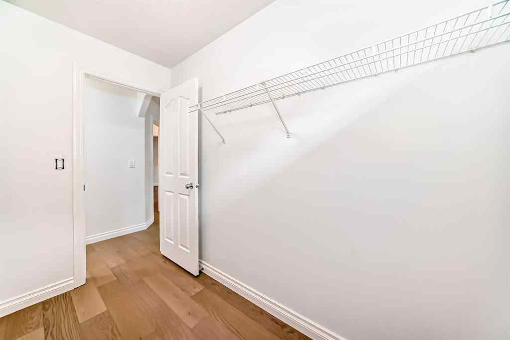 MLS® A2245594 - 18 West Cedar Place SW in West Springs Calgary, Residential
