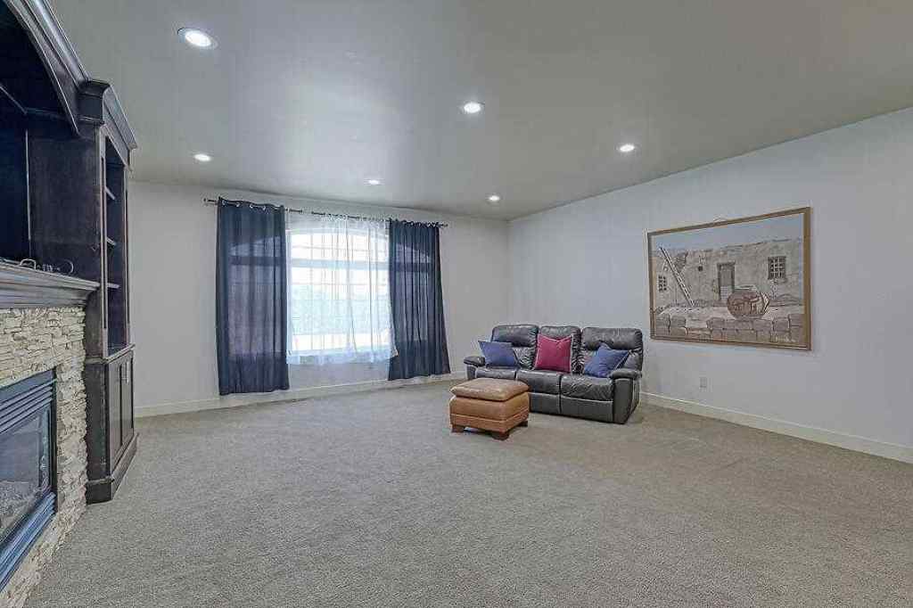 MLS® A2245598 - 16 Rockcliff Point NW in Rocky Ridge Calgary, Residential
