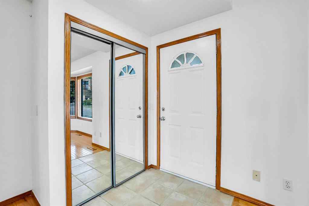 MLS® A2245640 - 209 Patina Park SW in Patterson Calgary, Residential