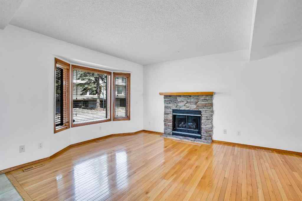 MLS® A2245640 - 209 Patina Park SW in Patterson Calgary, Residential