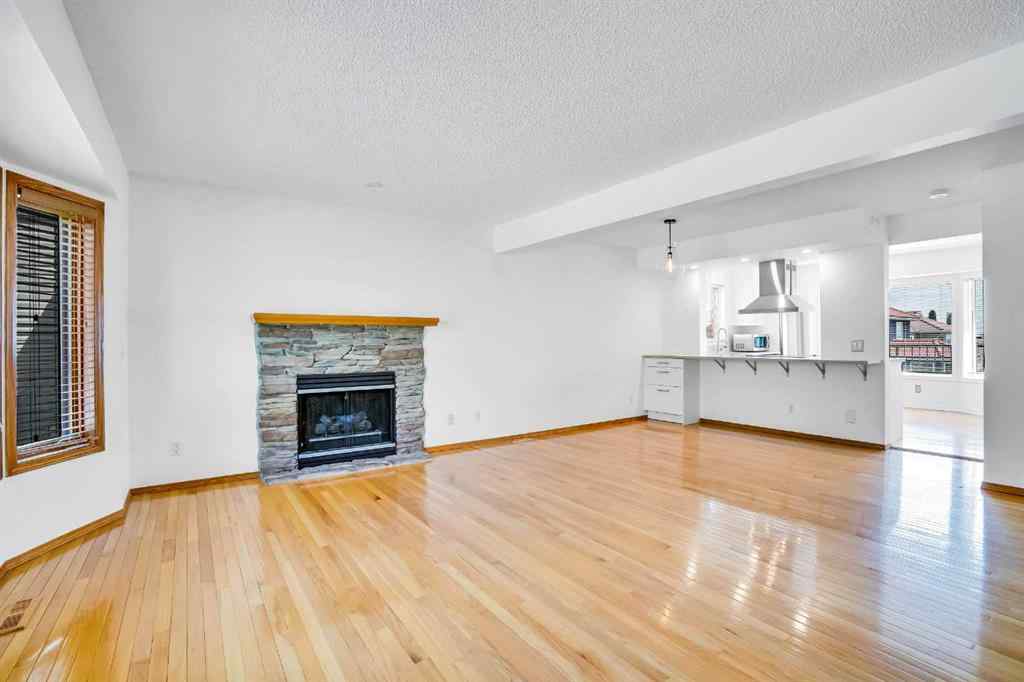 MLS® A2245640 - 209 Patina Park SW in Patterson Calgary, Residential
