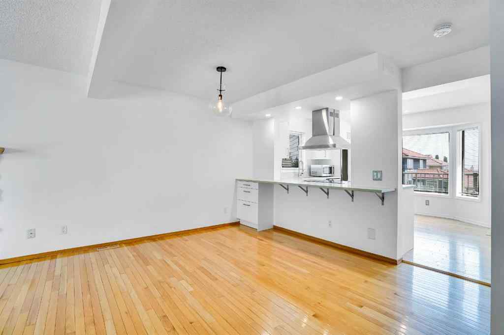 MLS® A2245640 - 209 Patina Park SW in Patterson Calgary, Residential
