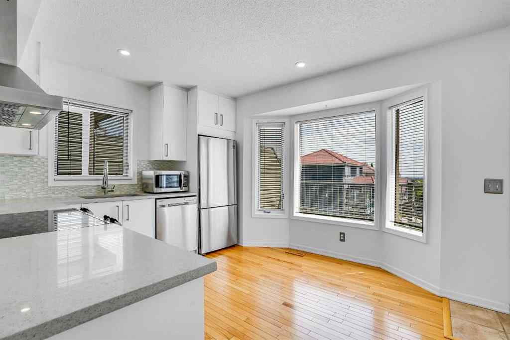 MLS® A2245640 - 209 Patina Park SW in Patterson Calgary, Residential