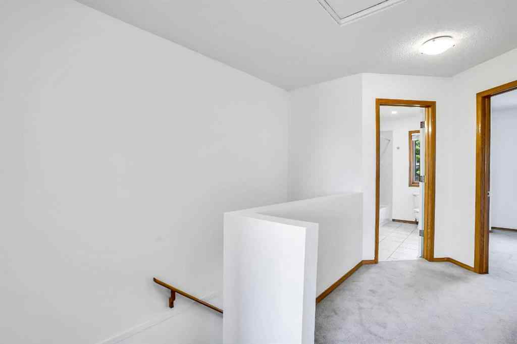 MLS® A2245640 - 209 Patina Park SW in Patterson Calgary, Residential
