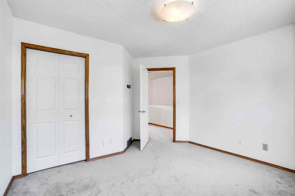 MLS® A2245640 - 209 Patina Park SW in Patterson Calgary, Residential