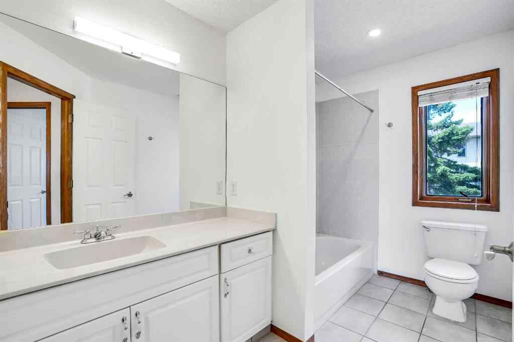 MLS® A2245640 - 209 Patina Park SW in Patterson Calgary, Residential