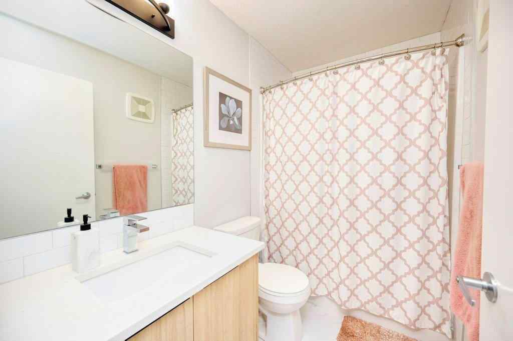 MLS® A2245673 - 50 Cranbrook Gardens SE in Cranston Calgary, Residential