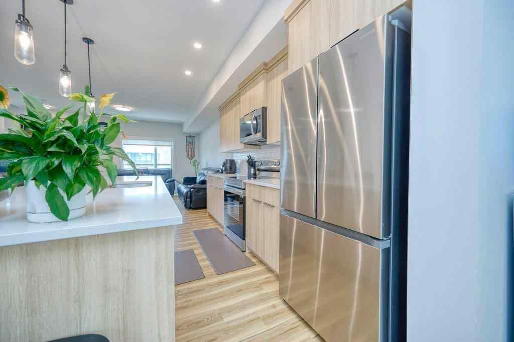 MLS® A2245673 - 50 Cranbrook Gardens SE in Cranston Calgary, Residential