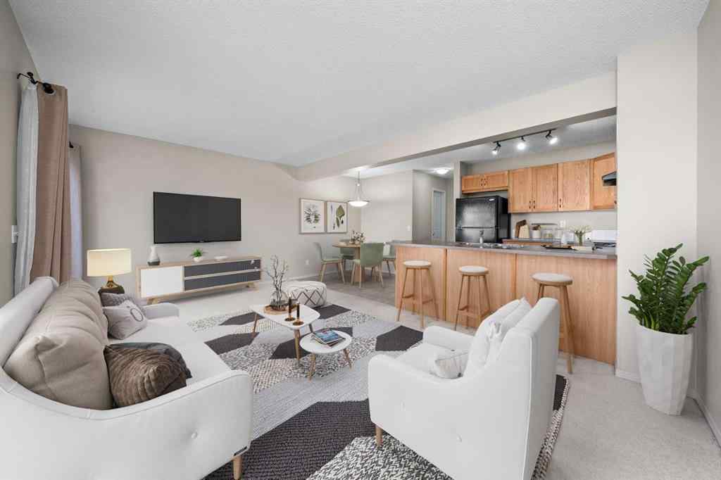 MLS® A2245677 - Unit #7 105 Drake Landing Common  in Drake Landing Okotoks, Residential