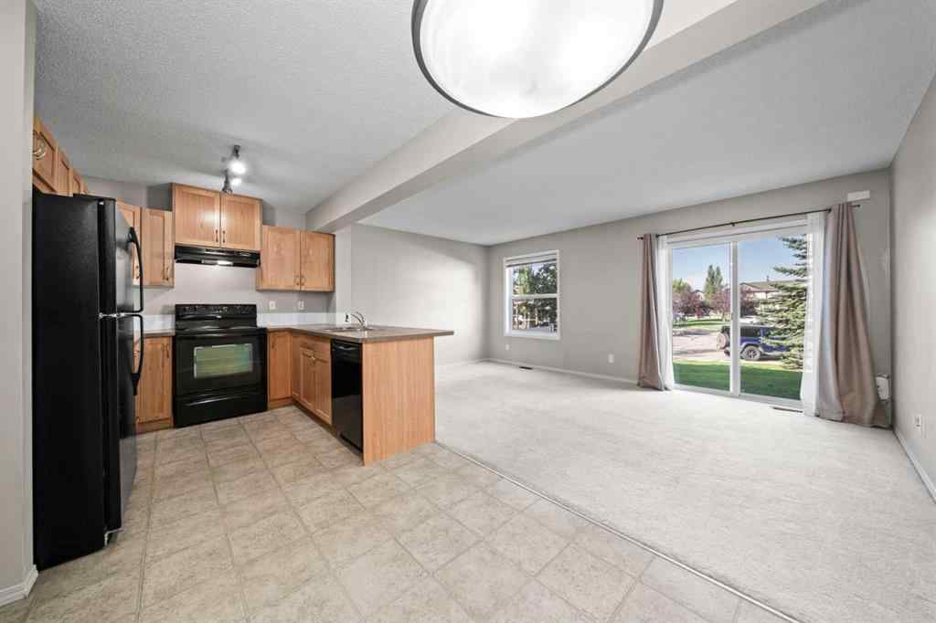 MLS® A2245677 - Unit #7 105 Drake Landing Common  in Drake Landing Okotoks, Residential