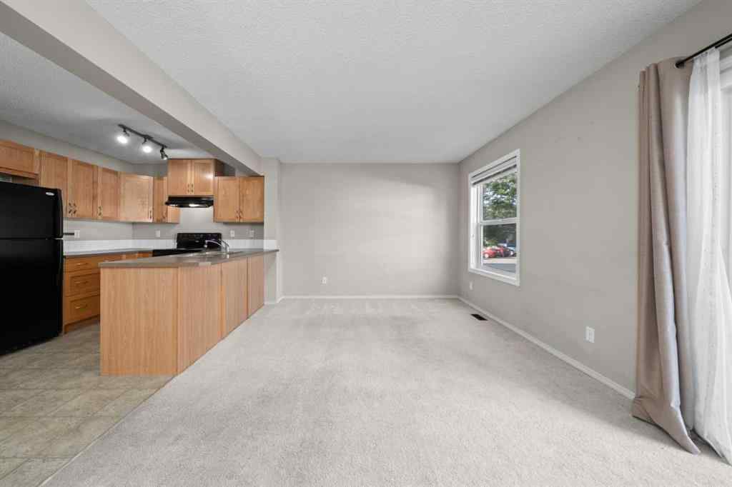 MLS® A2245677 - Unit #7 105 Drake Landing Common  in Drake Landing Okotoks, Residential