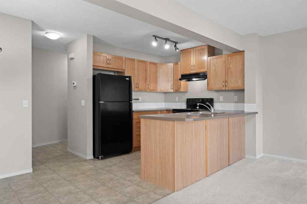 MLS® A2245677 - Unit #7 105 Drake Landing Common  in Drake Landing Okotoks, Residential