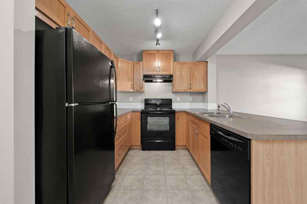MLS® A2245677 - Unit #7 105 Drake Landing Common  in Drake Landing Okotoks, Residential