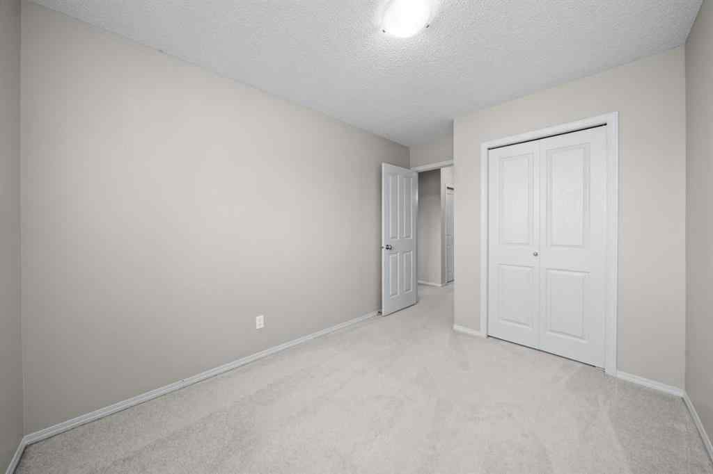 MLS® A2245677 - Unit #7 105 Drake Landing Common  in Drake Landing Okotoks, Residential
