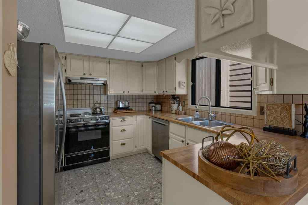 MLS® A2245703 - 120 Deercross Road SE in Deer Run Calgary, Residential