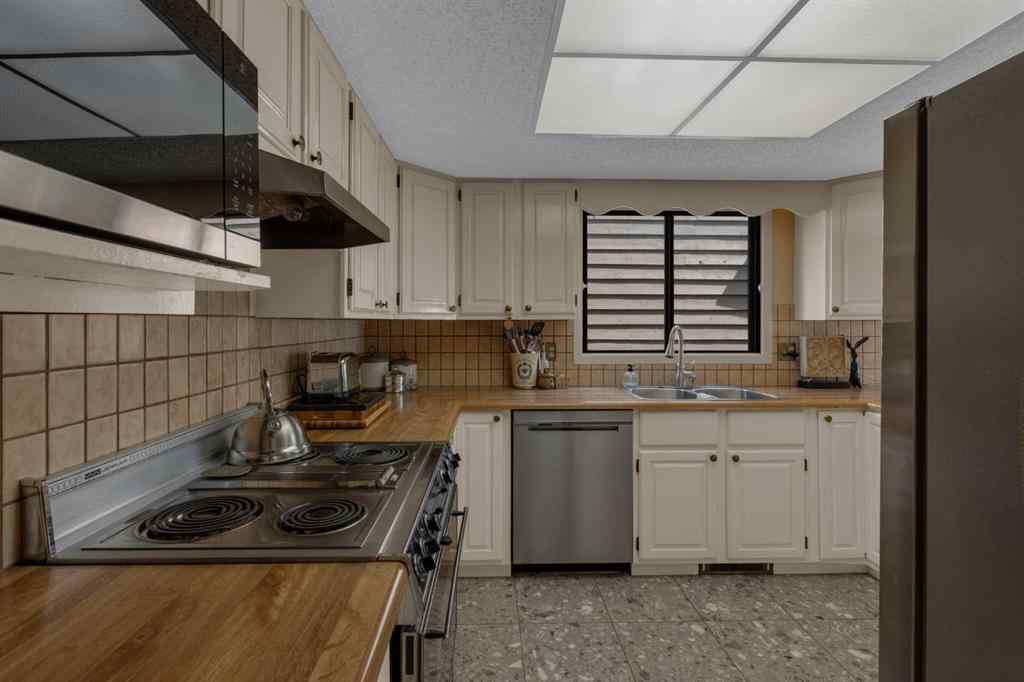 MLS® A2245703 - 120 Deercross Road SE in Deer Run Calgary, Residential
