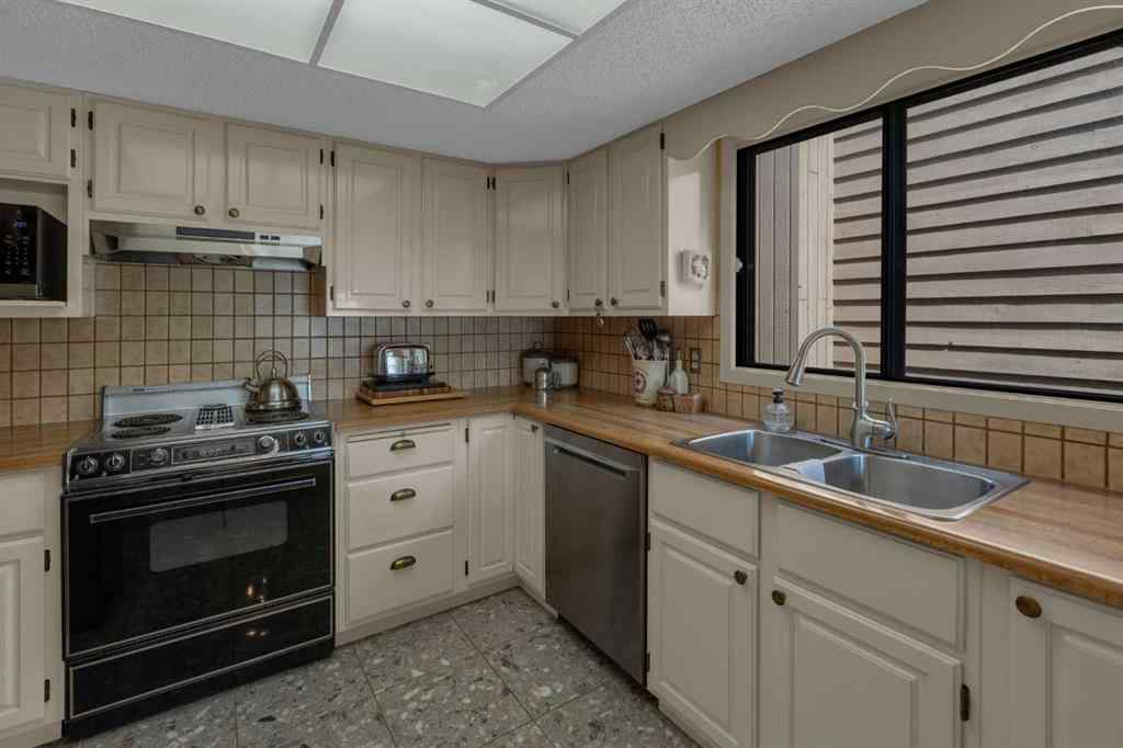 MLS® A2245703 - 120 Deercross Road SE in Deer Run Calgary, Residential