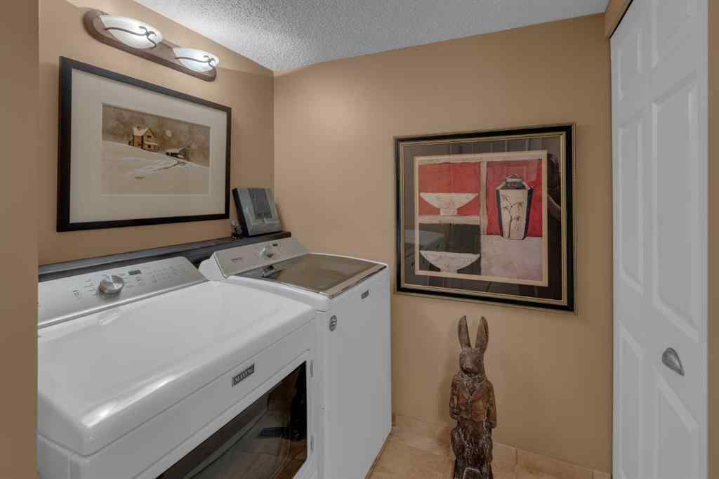 MLS® A2245703 - 120 Deercross Road SE in Deer Run Calgary, Residential