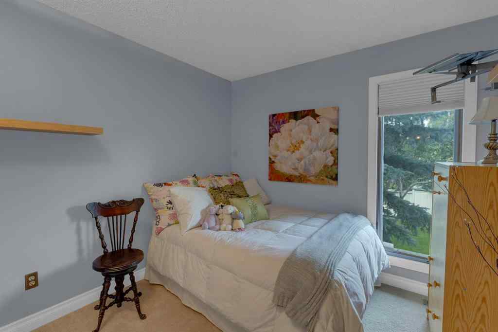 MLS® A2245703 - 120 Deercross Road SE in Deer Run Calgary, Residential