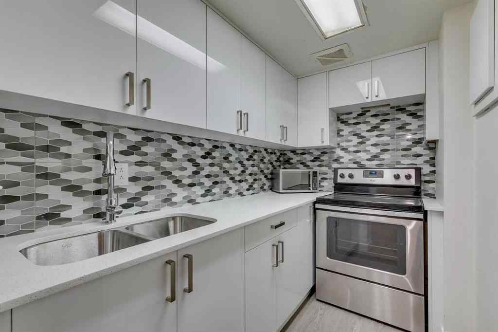 MLS® A2245720 - Unit #111 5404 10 Avenue SE in Penbrooke Meadows Calgary, Residential