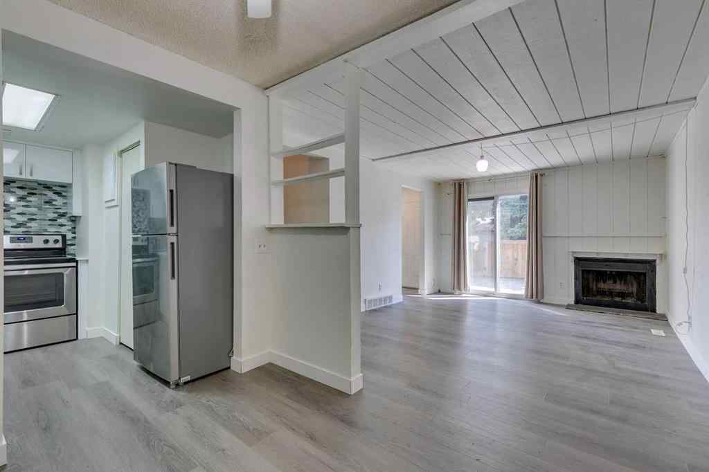 MLS® A2245720 - Unit #111 5404 10 Avenue SE in Penbrooke Meadows Calgary, Residential