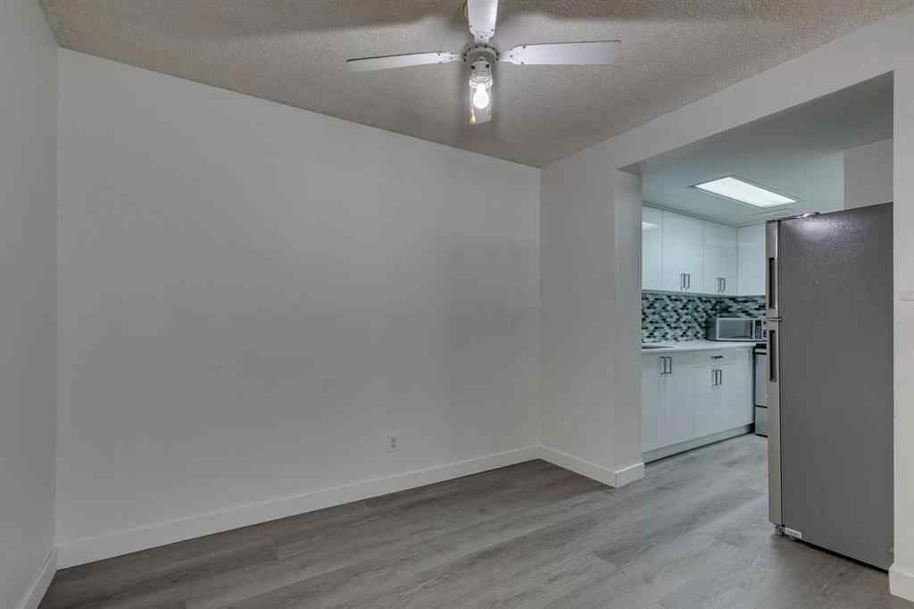 MLS® A2245720 - Unit #111 5404 10 Avenue SE in Penbrooke Meadows Calgary, Residential