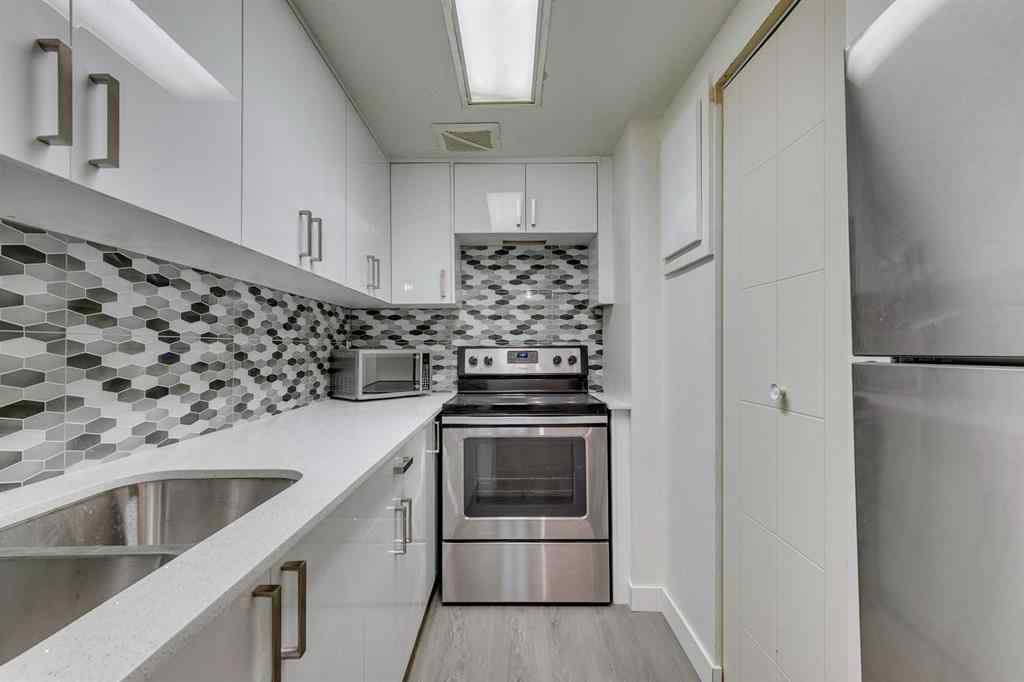 MLS® A2245720 - Unit #111 5404 10 Avenue SE in Penbrooke Meadows Calgary, Residential