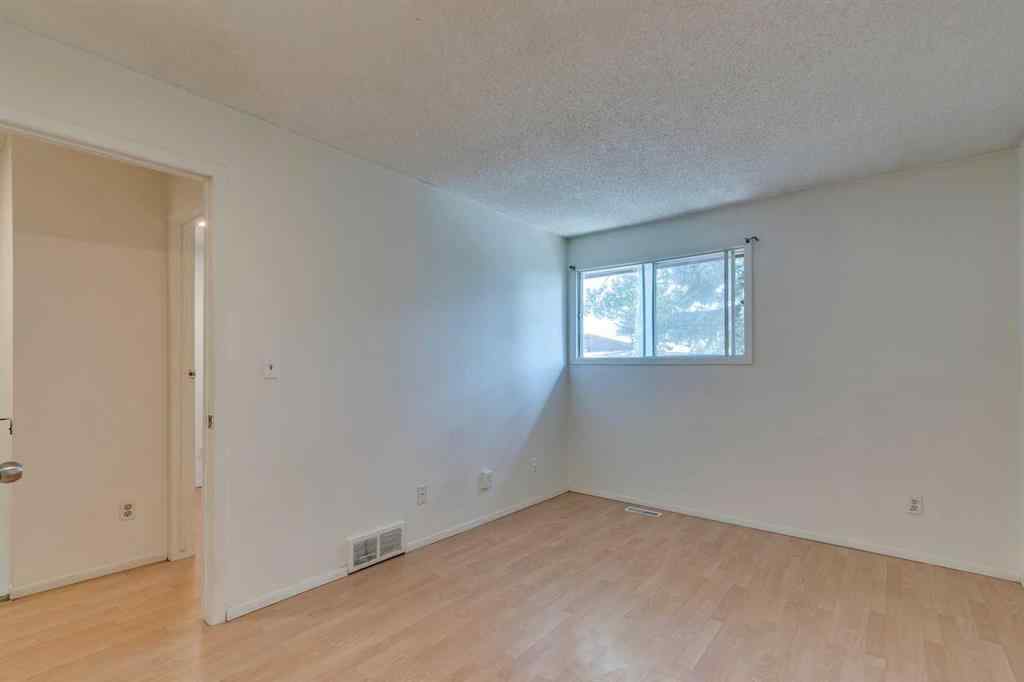 MLS® A2245720 - Unit #111 5404 10 Avenue SE in Penbrooke Meadows Calgary, Residential