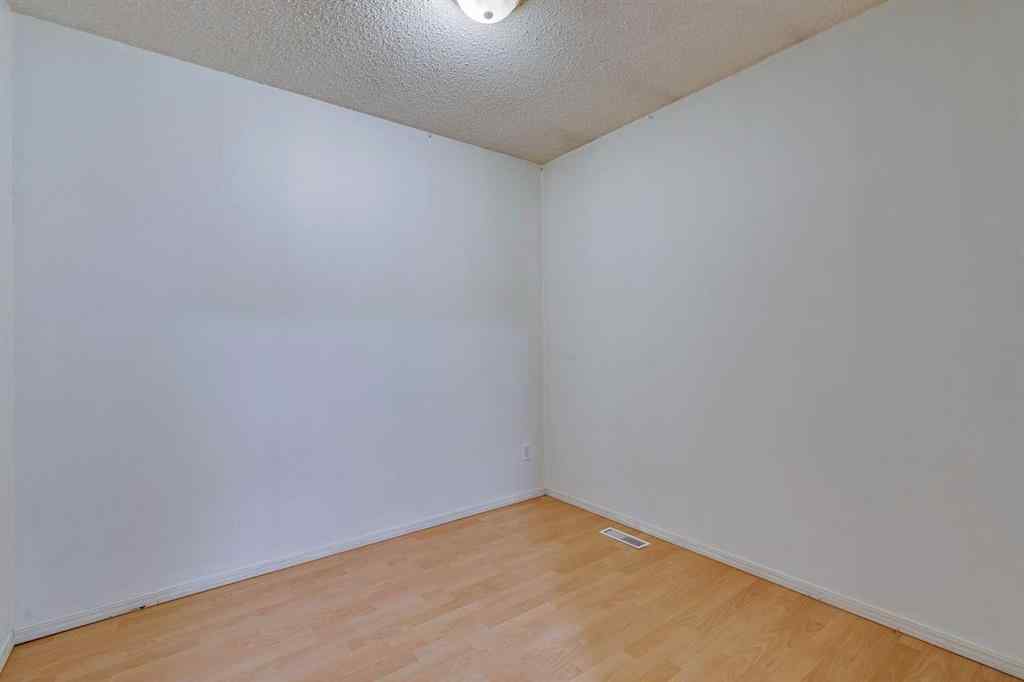MLS® A2245720 - Unit #111 5404 10 Avenue SE in Penbrooke Meadows Calgary, Residential