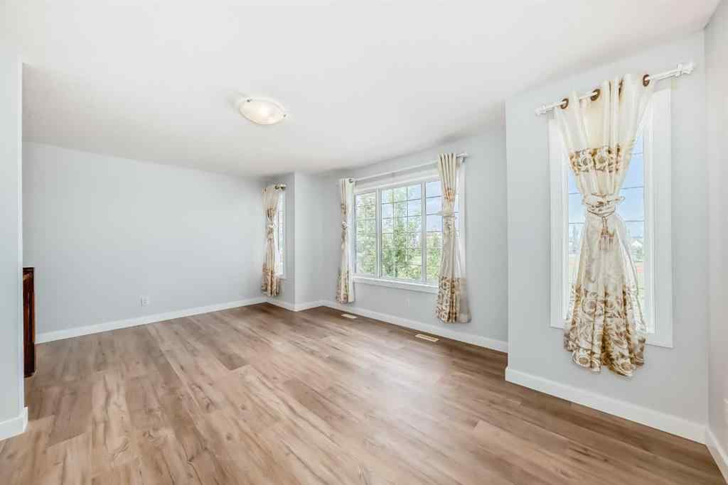 MLS® A2245748 - 77 Eversyde Close SW in Evergreen Calgary, Residential