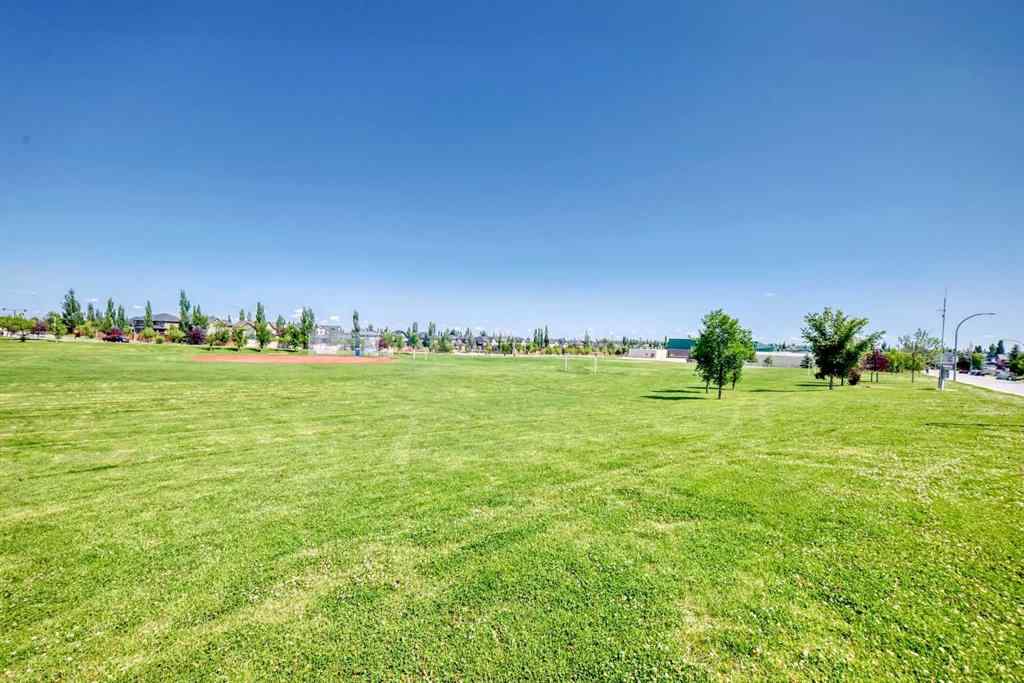 MLS® A2245748 - 77 Eversyde Close SW in Evergreen Calgary, Residential