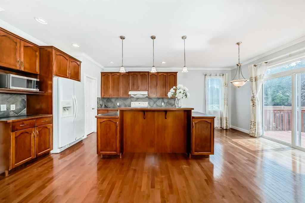 MLS® A2245748 - 77 Eversyde Close SW in Evergreen Calgary, Residential