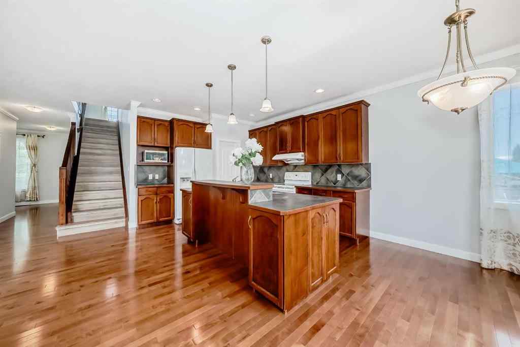 MLS® A2245748 - 77 Eversyde Close SW in Evergreen Calgary, Residential