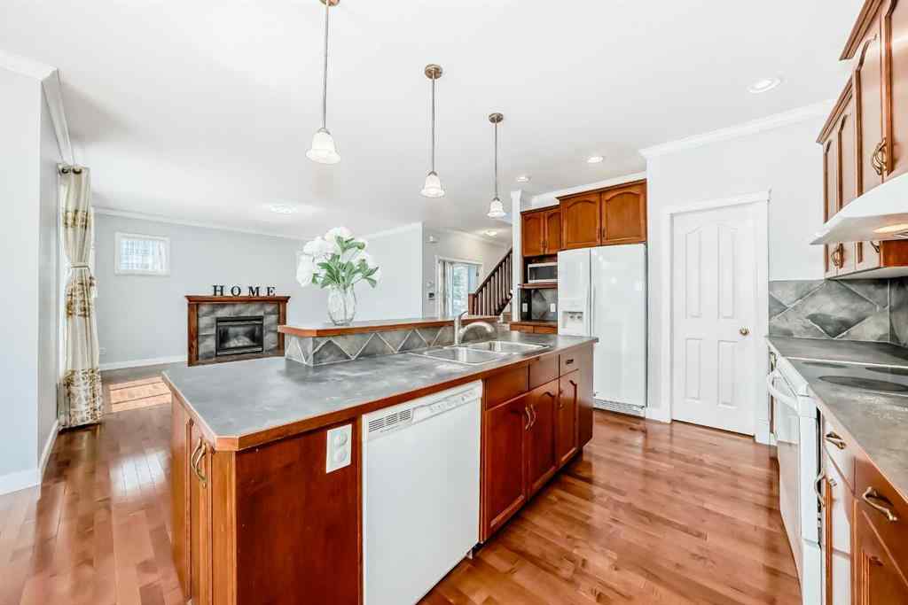MLS® A2245748 - 77 Eversyde Close SW in Evergreen Calgary, Residential