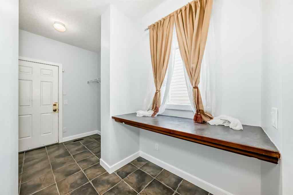 MLS® A2245748 - 77 Eversyde Close SW in Evergreen Calgary, Residential